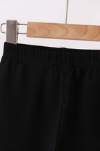 Black icing ruffle pants