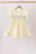 Cream smocked ruffle dress